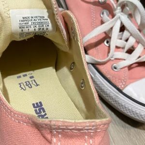 Pink Chuck Taylor shoes